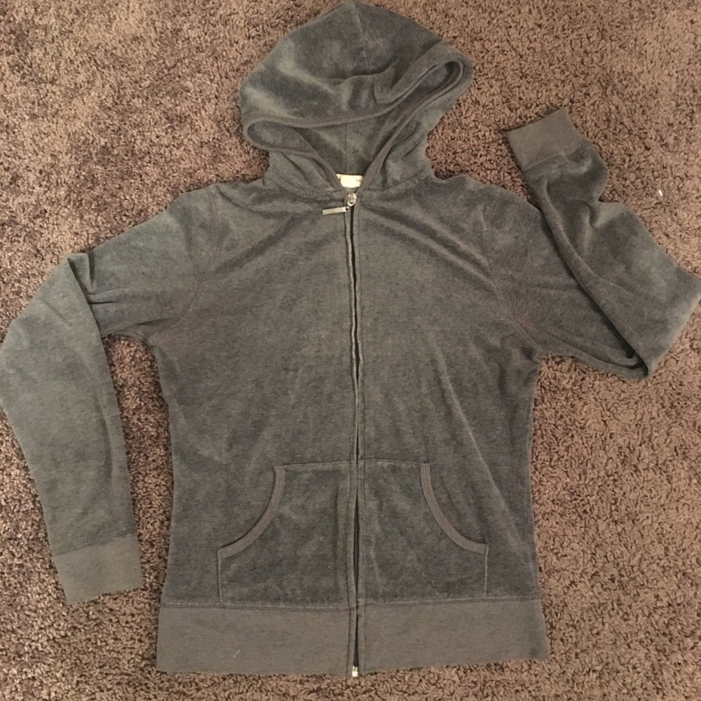 Velour zip up jacket. Design on back.